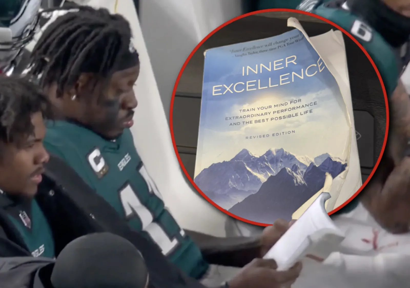 A.J. Brown reading Inner Excellence on the sideline
